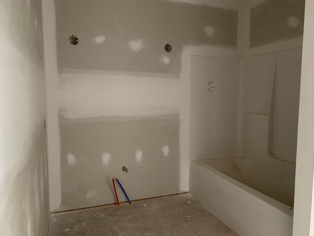 bathroom 3 vanity area and tub