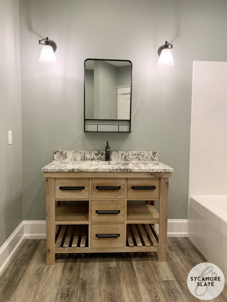 single wood farmhouse vanity with shelf / mirror above