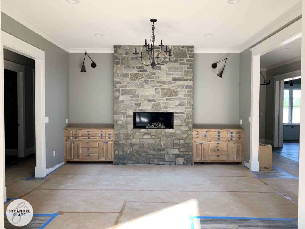 dining room fireplace with flanking buffet servers