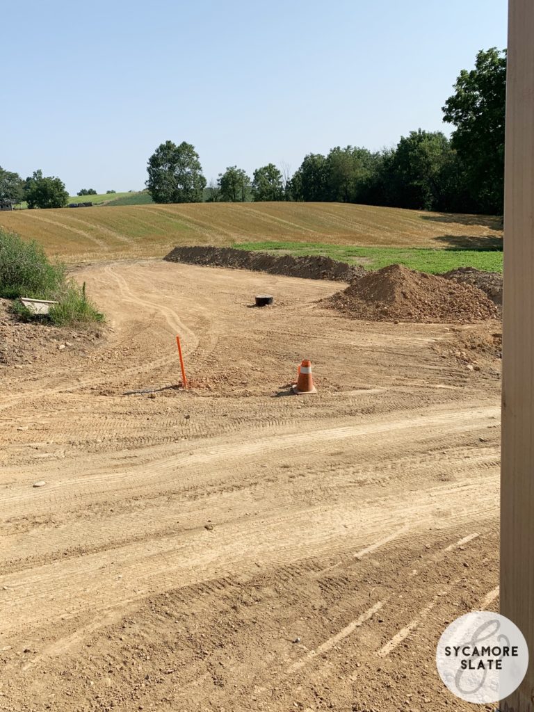 gas tank and sand mound