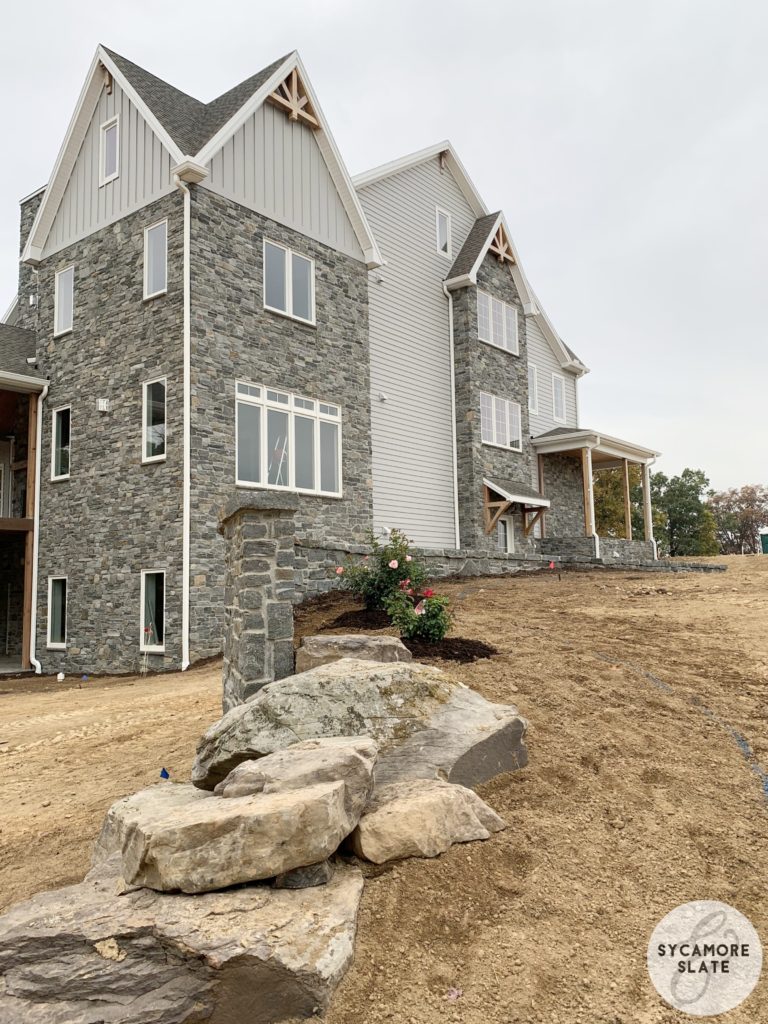 landscaping - stone wall, large boulders, roses